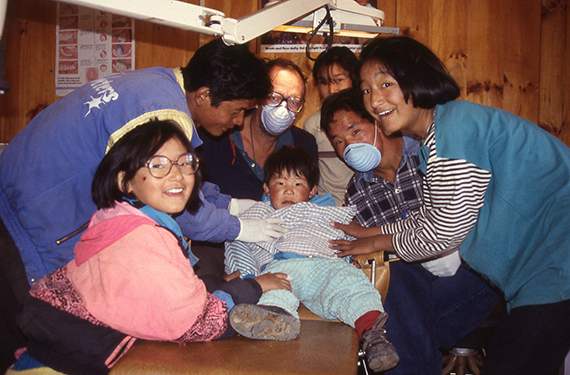 Dr Shinn helps small boy_Nepal 1