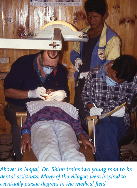 Dr. Shinn trains dental assistants pic